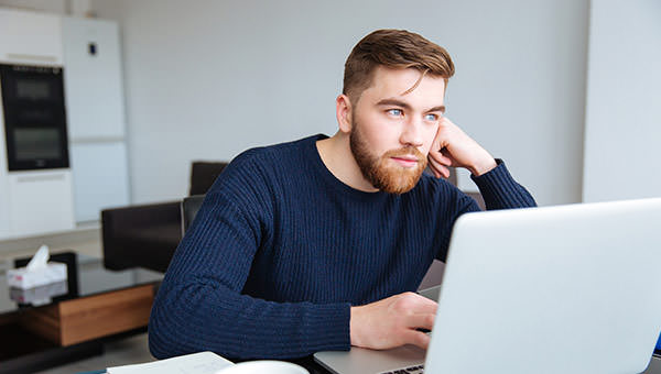 bigstock-Portrait-of-a-pensive-man-sitt-116054882