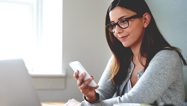 bigstock-Woman-Sitting-In-Home-Office-C-91210346